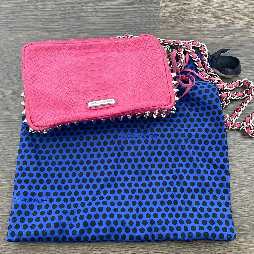 Rebecca Minkoff pink crossbody with silver studs.